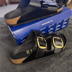Birkenstock Black Sandals with Gold Buckles